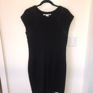 Diane von Furstenberg cap sleeve dress in black.